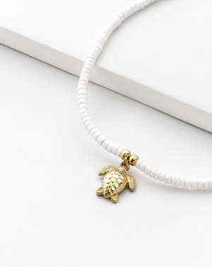 Puka Shell Choker with Gold Honu